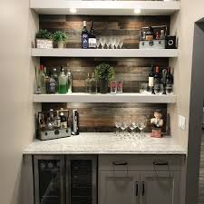 Rustic reclaimed large wooden wine rack lower rack on this size provides ideal storage for 8 wine glasses. 3 Reclaimed Peel And Stick Solid Wood Wall Paneling Diy Home Bar Home Bar Designs Kitchen Remodel