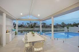 Sandy Cove Luxury Gold Coast Holiday Homes Beach Waterfront Goldcoast Australia Holidayhome Outdoor Table Holiday Home House Styles Coastal Lifestyle