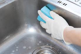 how to clean your kitchen sink properly