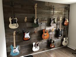 Since 2013 we have been on a mission to bring you the best music gear for your money. I Installed A Reclaimed Wood Wall To Hang My Guitar Collection On Album On Imgur Guitar Room Music Room Home Music Rooms