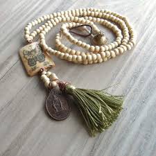 Mala Tassel Necklace In Cream Wood With Chartreuse Green Tassel And Buddhist Amulet Pendant Mala Jewelry Beaded Jewelry Tassel Jewelry