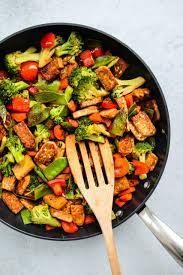 Tempeh Stir Fry With Spicy Coconut Sauce Walder Wellness Dietitian Recipe Tempeh Recipes Tempeh Stir Fry Easy Vegetarian Dinner