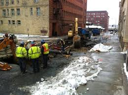 Photos of the week: Blizzard, flood and winter surfing