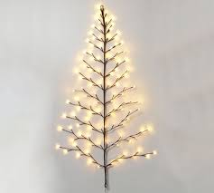 The most common light up wall decor material is plastic. Light Up Led Tree Shaped Wall Decor Pottery Barn