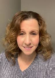 Is this 12 1/2" vase an Empoli and what is its value?