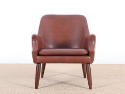 This collection will draw the crowds in your living room for its wildly good looks. Mid Century Modern Scandinavian Lounge Chair In Cognac Leather Galerie Mobler