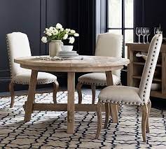 It looks like 4 chairs fits the best (which is fine sinc. Toscana Extending Dining Table Pottery Barn