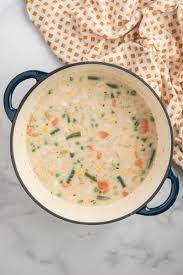 Rich, comforting and crazy easy to make, this creamy chicken and wild rice soup recipe is one you will want to make again and again! Creamy Chicken And Rice Soup Recipe Girl