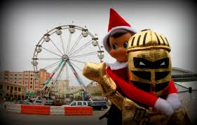 Knightro Checking Out Light Up Ucf During The Holidays With A New Friend Elf On A Shelf Black And Gold Outfit Ucf Gold Outfit