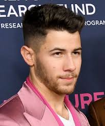 Nick Jonas Short Straight Black Hairstyle