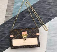The wallet on chain or woc is another accessory that should be a part of every fashionista's collection. Louis Vuitton Vavin Chain Wallet Monogram Creme Bags Valley
