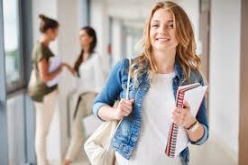 Proper preparation for your exams is the key to success. Free Photo Young Brunette Girl With Cute Smile Spreading Palms Aside