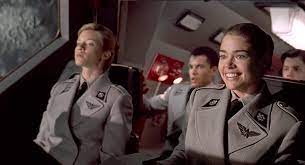 She garnered widespread recognition after appearing in. Starship Troopers 1997