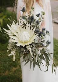 This Bride Wore A Bouquet Of Blue White And Inexperienced Melbourne Botany Which Was Distinguishe Bohemian Wedding Bouquet Protea Wedding Cheap Wedding Flowers