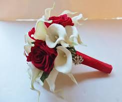 Whether you're sending a bouquet of anniversary flowers to the special someone in your life, reminding your mom how important she is to you, or saying congratulations to that new graduate, a bouquet of roses for delivery is the perfect way to send your love. Red Rose And White Lily Wedding Bouquet