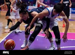 Jakarta. 30th Aug, 2018. Park Jisu (L) of team Korea competes during  women's basketball semifinals between Chinese Taipei and the unified team  of the Democratic People's Republic of Korea and South Korea