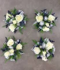Nancy reagan, the owner, has been a part of the floral industry for more than 20 years, providing service that always exceeds the couple's. White Spray Rose Corsage With Blue Thistle Accents By Nancy At Belton Hyvee Rose Corsage White Spray Roses Spray Roses