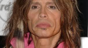 Rock stars win paparazzi victory