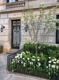 Heather cross is a longtime new york resident who has written about the city since 2002. At Home On The Upper East Side Upper East Side Front Porch Design Townhouse Garden