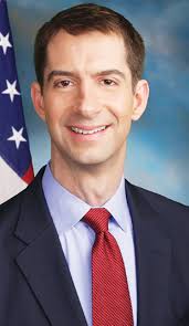 Representative Johnny Rye presents flags to Trumann High School leader...