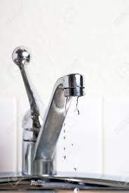 Finally, remove the retainer ring by unthreading it counter clockwise. Dripping Faucet Leaking Into The Sink In The Kitchen Stock Photo Picture And Royalty Free Image Image 5767542