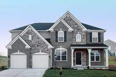 Coordinating grey shutters and trim color in a white brick house exterior 16 Best Grey Brick House Ideas Grey Brick Houses Grey Brick House Exterior