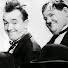 Laurel and Hardy: Why didn't you tell me you had 2 legs