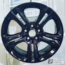 A metallic black powder coat or chrome black powder coat will spice up your hot rod. Custom Rims Coated In Iced Black Cherry Prismatic Powders