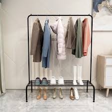 Spinning round garment rack revolving round clothing rack rotating round clothes rack displays for retail apparel merchandising subastral. G4oe1m965zuwgm