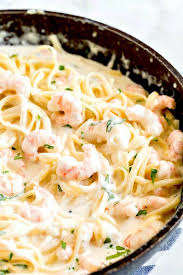Pasta Tossed With Creamy Garlic Parmesan Sauce And Shrimp In A Skillet Shrimp Alfredo Recipe Creamy Shrimp Alfredo Recipe Pasta Recipes Alfredo