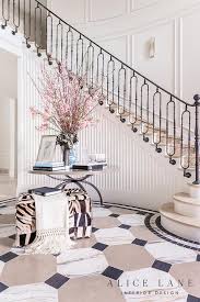 The round table was a table used by king arthur and his knights, in the legends about him. Round Table In Curved Staircase Transitional Entrance Foyer