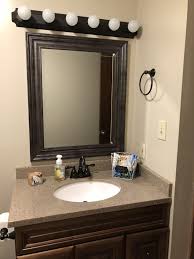 This is a warm color. Wall Color Is Sherwin Williams Ball Twine Vanity Cabinet Is Ballantyne Mocha With Ebony Finish Faucet Is Bathroom Makeover Ballantyne Vanity Bathroom Decor