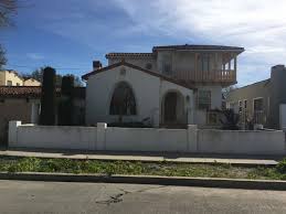 The wood trim that was under the roof was painted white and we want to sand it down and stain it dark. Exterior Paint Color For Spanish Colonial Revival