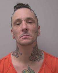 Man arrested in Wisconsin after firing gun inside a home while allegedly  intoxicated