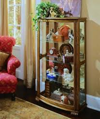 Pulaski curio cabinet, hand painted glass shelves, light, 2 drawers& beautiful. Pulaski Pepper Oak Mantel Curio Cabinet Pulaski Furniture 20877 Curio Cabinets