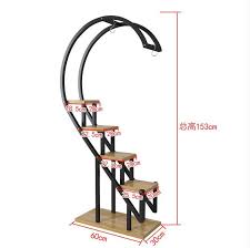 Etagere A Fleurs Circulaire Multi Etages Etagere Decorative En Fer Pour Le Balcon Interieur Lotus Vert Pendentif D Orchidee Salon De La Maison Alie In 2020 Plant Shelves Household Plants Plant Decor
