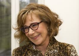 Zoe Wannamaker is Iris Fisher