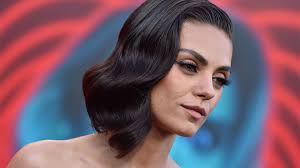 This isn't hard to believe since she is 5 feet 4 inches or 1.63 m (163 cm) tall and weighs only 115 pounds or 52 kg. Mila Kunis Wears Green Eyeshadow On Press Run Stylecaster