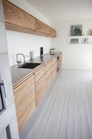 The shutters and trim give it some older elements; Get This Minimalist Kitchen Design With Natural Wood At Http Na Rehau Com Terra Utm Content Buffer Scandinavian Kitchen Design Kitchen Design Modern Kitchen