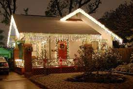 10 Creative Tips For Easily Decorating A Small Home For Christmas Christmas House Lights Christmas Lights Outside Hanging Christmas Lights
