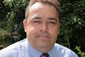 UKIP Cllr Garry Harrison of Chapman Way, East Malling, warns of dangerous  Giant hogweed which has erupted near St James The Great Academy