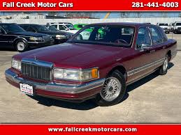 Image result for Toreador Red 1999 Town Car