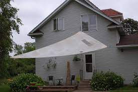 Make A Sun Shade From An Old Sail Patio Shade Deck Shade Diy Shades