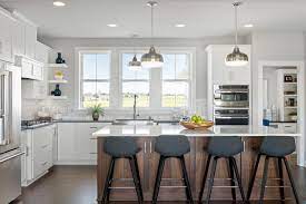 Save 15% on select furniture with code save15. 4 Kitchens With White Cabinets And A Wood Island