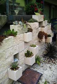 Adding flavor and style to the wall. 25 Concrete Block Ideas To Try And Enjoy Cheap Diy Outdoor Home Decorating