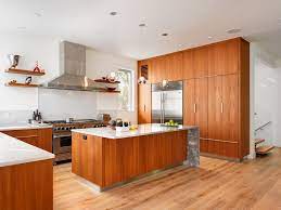 Residents of modern apartments are more bent on using customized furniture than the traditional ones for their interior decoration. Modern Teak Kitchen Modern Kitchen Vancouver By South Shore Cabinetry Ltd Houzz