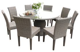 This set includes 2 captain chairs, 2 armless dining chairs, a bench and table that are perfect for entertaining. Oasis 60 Outdoor Patio Dining Table With 8 Armless Chairs Tropical Outdoor Dining Sets By Design Furnishings Oasis 60 Kit 8 Houzz
