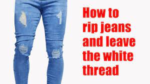 A ladder rip is when you have a long patch that is cut out with strands of the fibres running across. How To Rip Jeans And Leave The White Thread Youtube