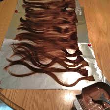 The process is moderately simple, but it does require some attention to detail and a strict adherence to the application time as well as the manufacturer's instructions. How To Dye Your Hair Extensions