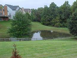 It depends upon the way the retention dam was made, what does it hold back, and if you're planning to live directly downstream from the thing. Understanding Stormwater Ponds Wet Ponds Dry Ponds And Stormwater Pond Retrofits Northern Virginia Soil And Water Conservation District